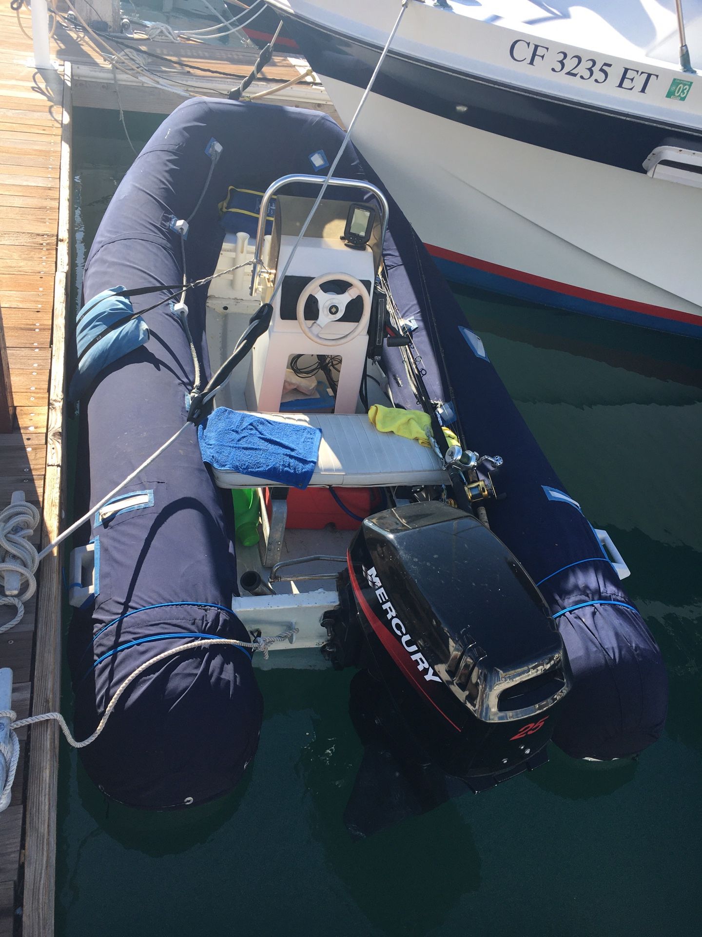 A B 12’ Aluminum hull center console dingy. 25 h p 4 stroke Mercury