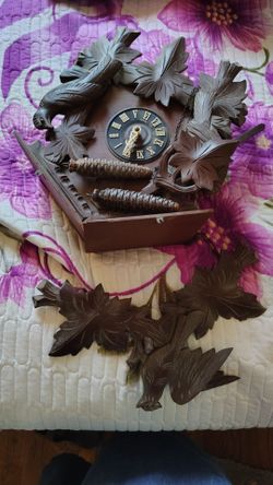 old cuckoo clock,I haven't put it together but it's all complete,look at photos