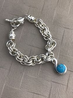 Silver plated Bracelet with blue stone charm $25