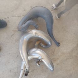 2 stroke expansion chambers (pipes)   3 total