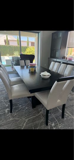 Dinning table with 6 leather chairs, and one beautiful sofa…