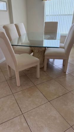 Heavy Glass Dinning table and six chairs