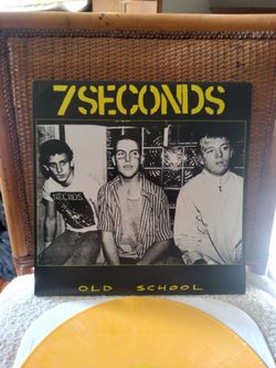 7 SECONDS - OLD SCHOOL on Yellow colored Vinyl. Cover has a slight bend on left upper corner. Vinyl is in Near Mint condition.