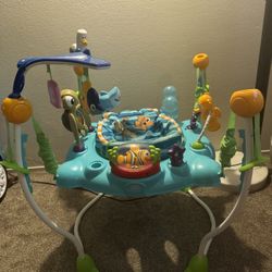 BRIGHT STARTS Vibrant Disney Baby Finding Nemo Activity Center Jumper $40 Dlls