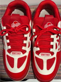 Red/white lv skates with tag