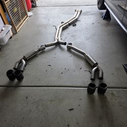 MBRP resonater Back Exhaust With Carbon Fiber Tips