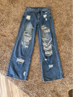 Ripped baggy jeans size small.