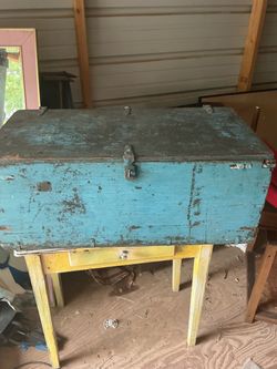Vintage Blue Wooden Storage Trunk it’s 12 inches tall 32 wide and 16 inches deep