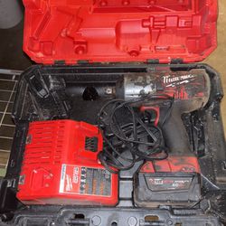 Milwaukee 1/2 Inch Impact With Case, Charger And One Battery 