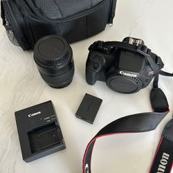 Canon EOS Rebel T100 / 4000D DSLR Camera with 18-55mm Lens (New) + 64GB Card + More