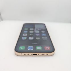 iPhone 12 pro max, gold color, 128 gigabytes, T-Mobile / MetroPcs carrier. In good condition