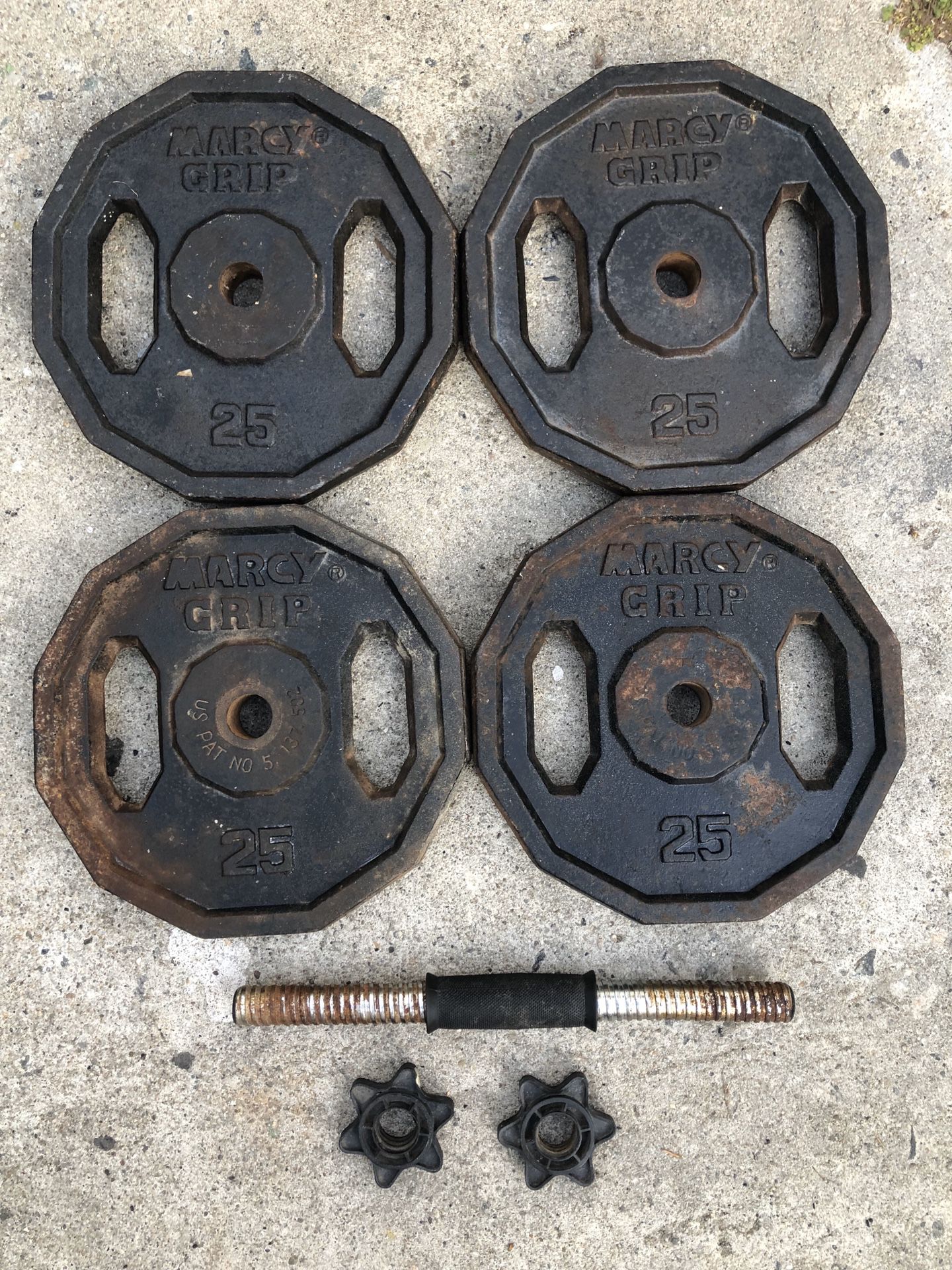 Standard Olympic 25lbs pairs comes with single dumbbells bar