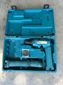 Makita 6095D 9.6V cordless dril, charging base & case