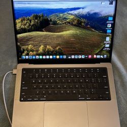 MacBook Pro 14”— M2 Pro, 16 GB RAM, 512 GB SSD