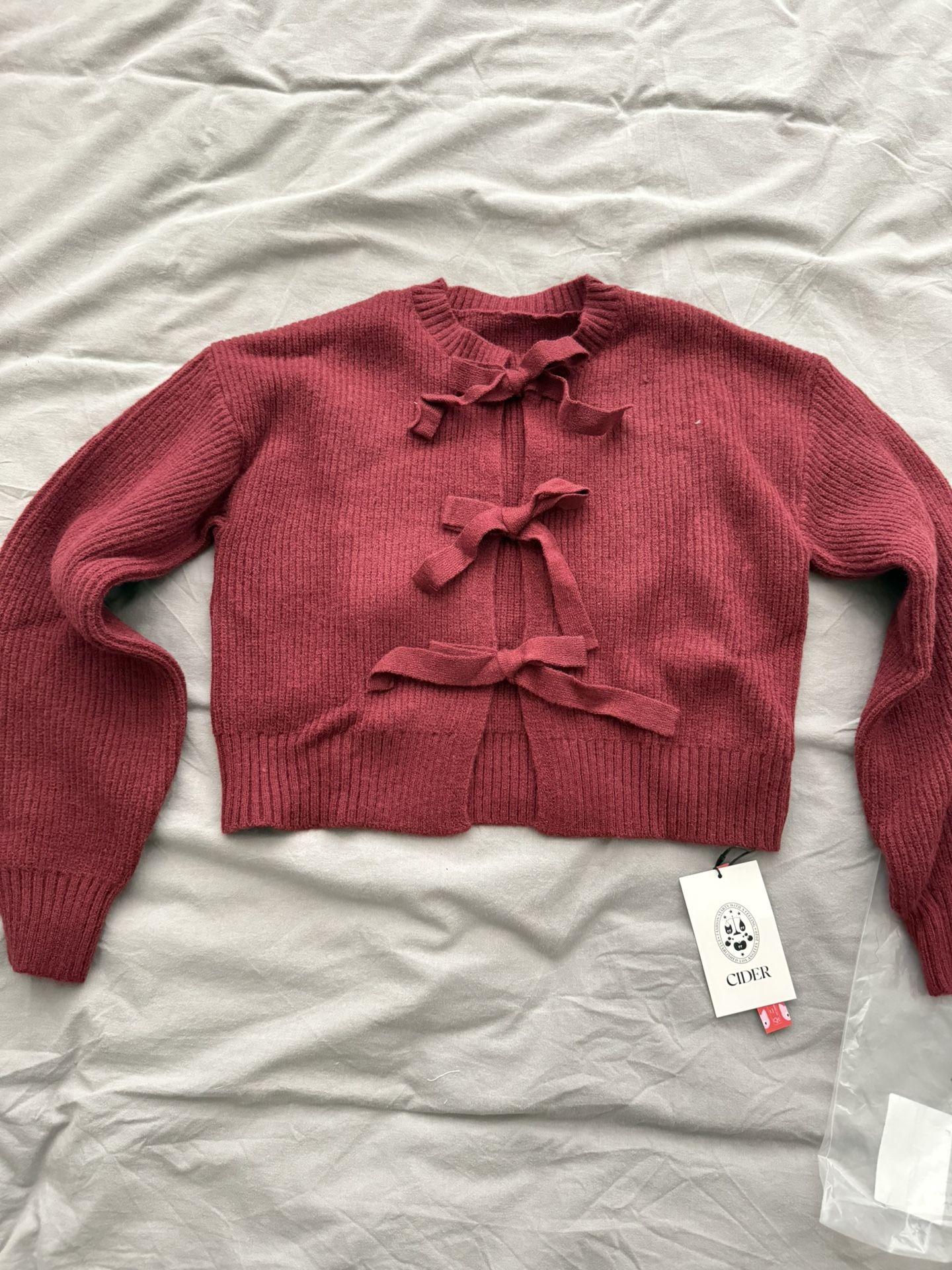 Cider KNIT ROUND NECK SOLID TIE FRONT BOWKNOT CARDIGAN