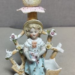 Vintage porcelain figurine candle holder