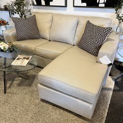 Gray and Cream Sectional Couches With Reversible Chaise And Sleeper 