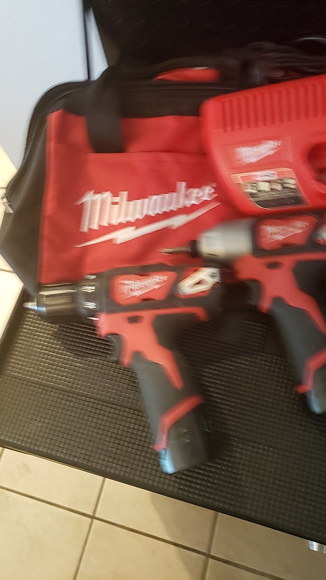 Milwaukee M-12 Matching 2 Tool Set!!! Looks & Works PERFECT!!! Includes 3/8" Drill , 1/4" Impact, 2 Batt W/Charger & Work Bag!! Must Sell!!! Offers??