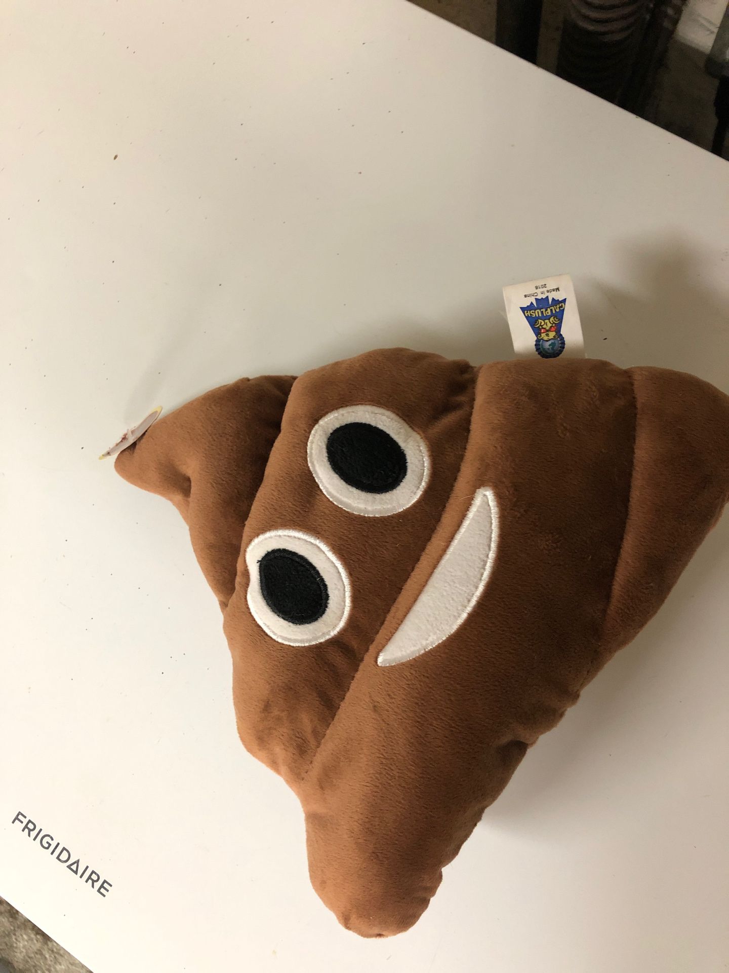 Poop emoji plushie