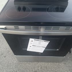 Brand New Stove And Microwave 