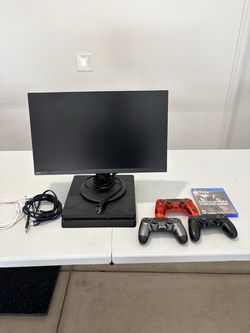 PS4 with monitor and controllers