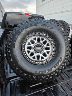 17" KMC w/ 37" Falken Wildpeak MT tires