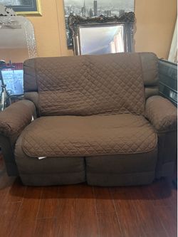 Love seat Recliner  with  seat cover.