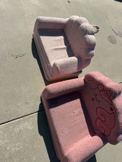 two toddler girls couches
