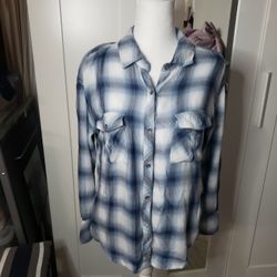 Really nice plaid shirt size xs, could fit size s. in great condition. perfect for casual wear