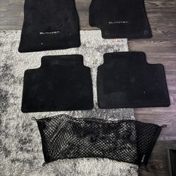 Hyundai Elantra OEM Black Floor Mats (Full Set) + Cargo Net 