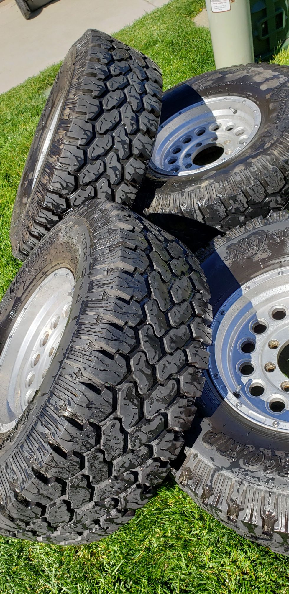 4 Pro Comp Extreme All Terrain tires. 315/75 R16 W/ aluminium 16 wheels