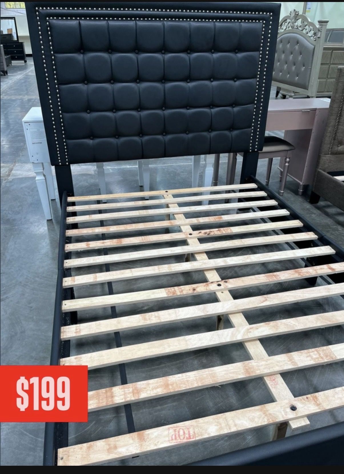 ✨ Modern Black Upholstered Bed Frame – $199 ✨ Upgrade your bedroom with this stylish and sturdy black upholstered bed frame. The tall padded headboar