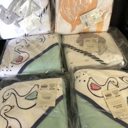 Brand new baby hooded bath towels seven dollars each