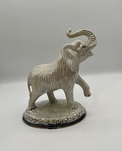 Elegant Cream Ceramic Elephant Figurine