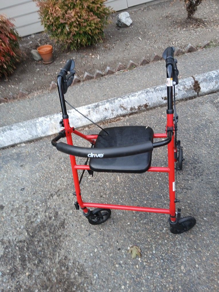 Wheel Chair Walker With Seat Only Asking 20