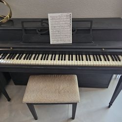 The WURLITZER Upright Piano 