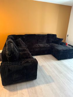 New sectional sleeper black