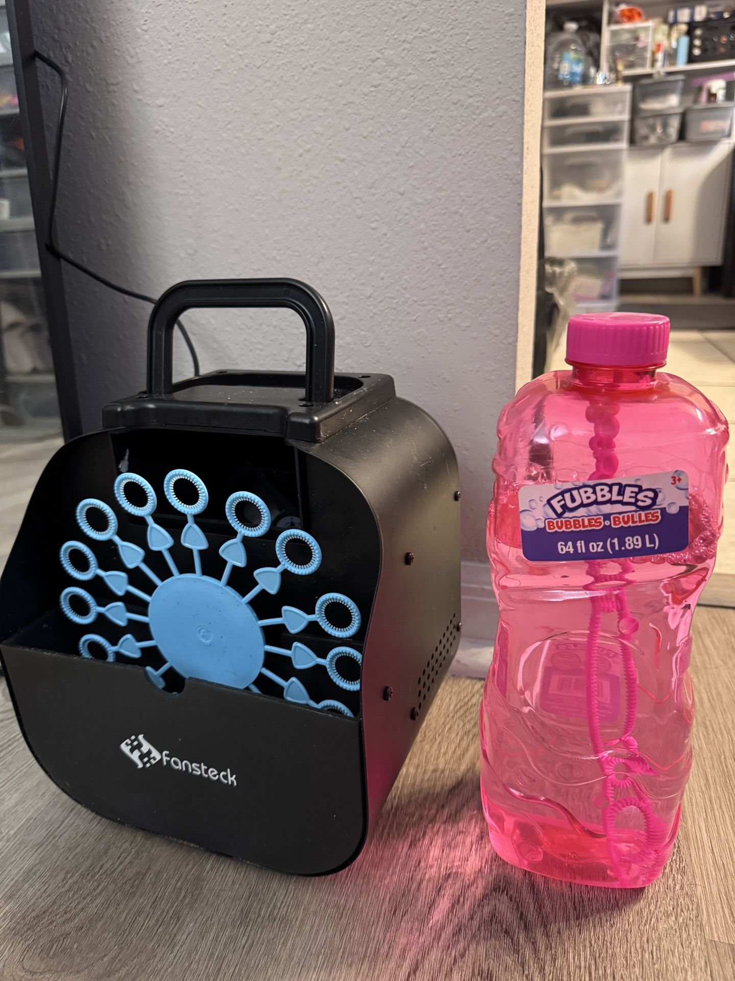 Indoor/Outdoor Bubble Machine - Comes With Large Bottle Of Bubbles. Works perfectly.