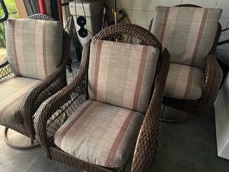 3 swivel patio chairs