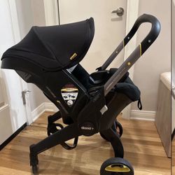 Doona Nitro Black Stroller With Infant Insert And Base