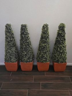 Artificial topiary trees with lights