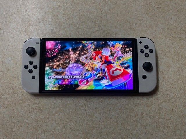 Switch OLED with 512gb and Over 100 Popular Games
