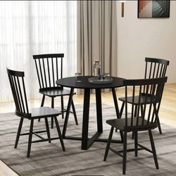 Set of 4 dining chairs. Brand new in box. Black