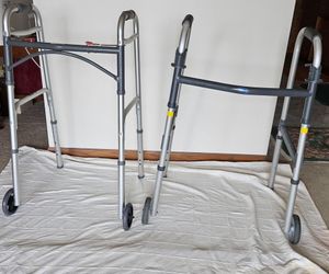 TWO FRONT WHEEL WALKERS