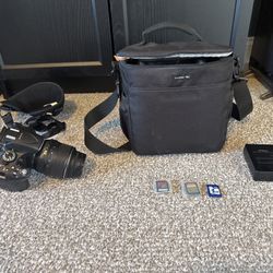 Nikon DSLR Camera Bundle – 18–55mm Lens, Bag, SD Cards