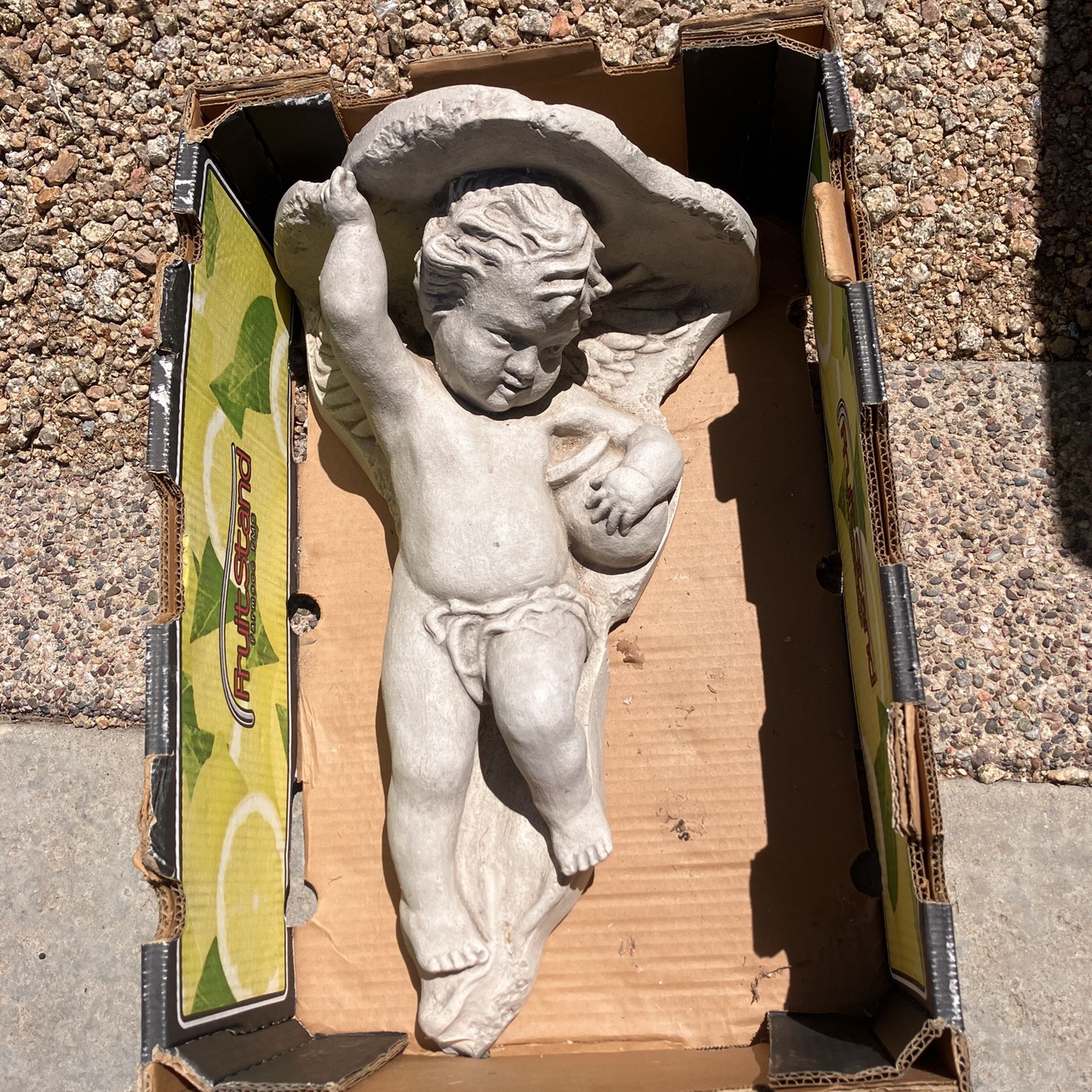 Wall Cherub Made Of Concert