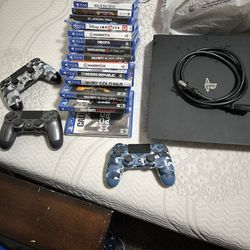 ps4 pro with games and controllers