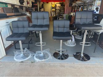 Brand new adjustable height bar stools only $60 each