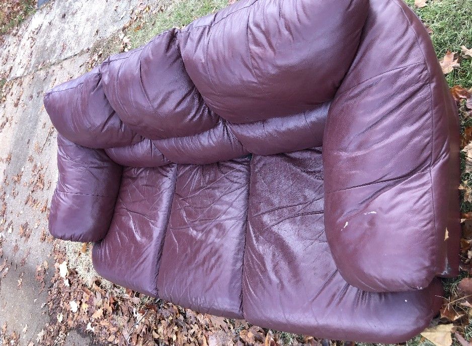 Free three-seater brown leather sofa