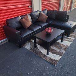 *Free delivery* Black right side sectional leather couch w/ long coffee table accent pillow and rug